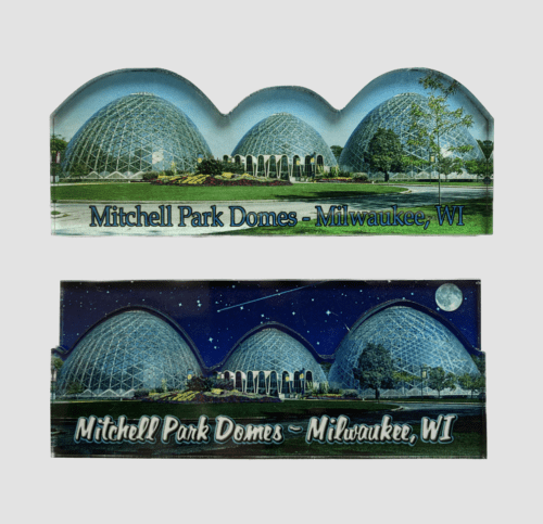 Two images of the Domes Magnet (top: "Daytime" / bottom: "Nighttime") showcase the Mitchell Park Domes in Milwaukee, WI. The top image captures the domes during daylight, with a clear sky and lush greenery. The bottom image portrays the domes at night, bathed in light under a starry sky and a full moon, with the same vibrant greenery.